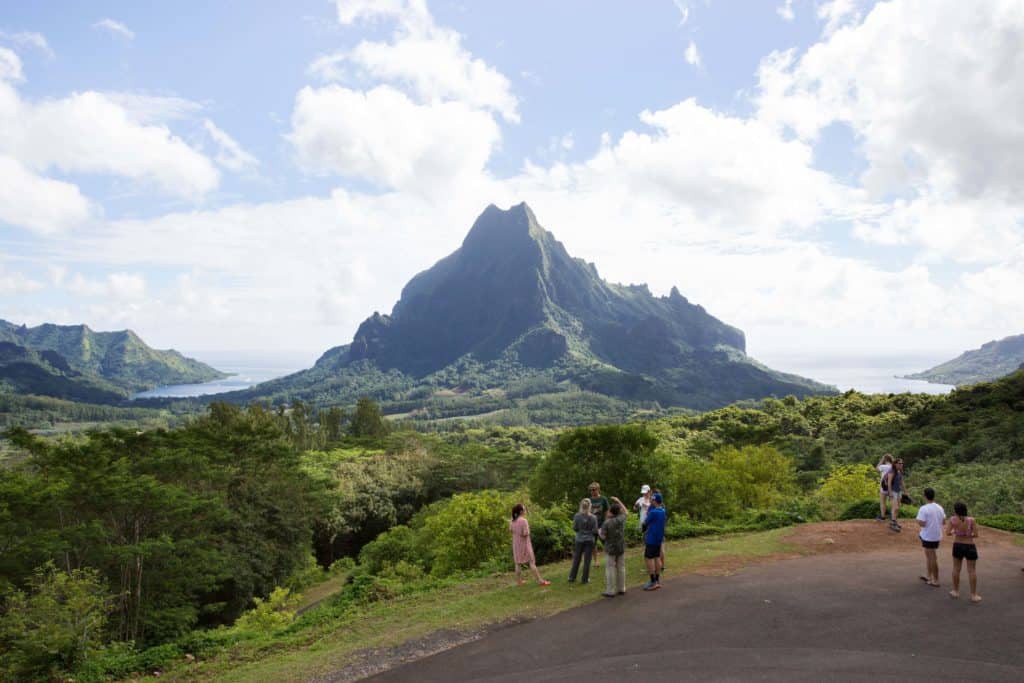 Tourists in front of Tahiti's Mount Rotui