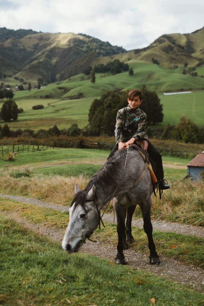 A boy on a horse in New Zealand