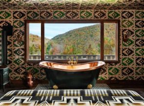 New hotels: Bathtub and a view at Urban Cowboy Lodge in Big Indian, New York