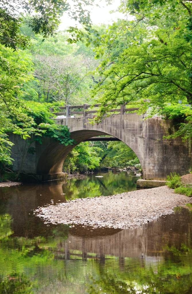 A stone bridge across a river. 