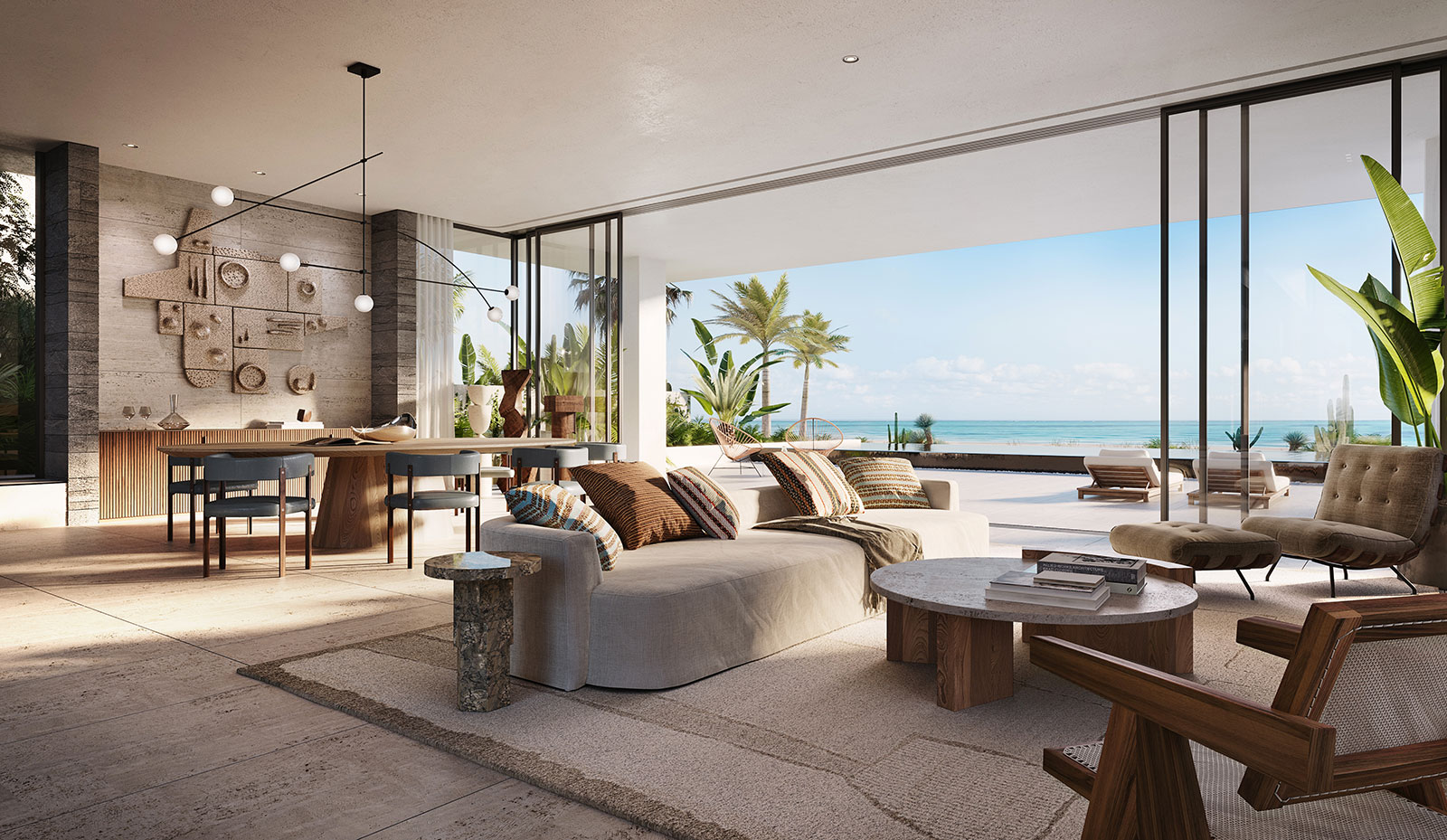 An open-plan lounge in warm tones, overlooking the ocean. 