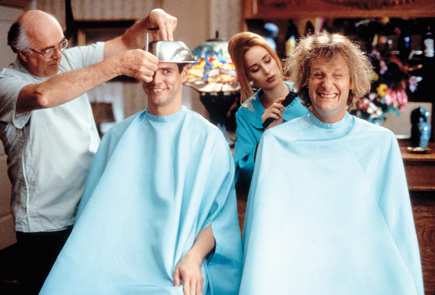 Two crazy looking men at a hairdresser.