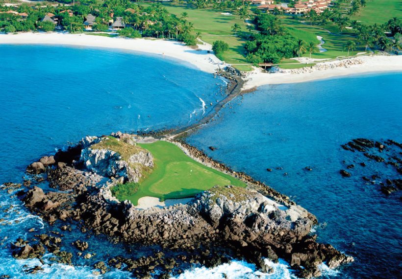 An ocean-side golf course from above.