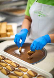 A person preparing chocolate.