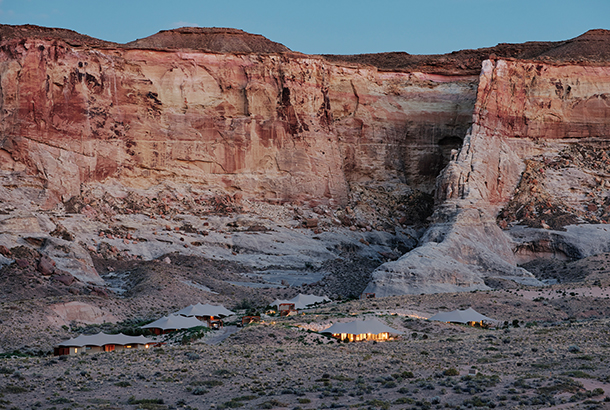 The luxury tents of Camp Sarika amidst towering mesas and canyons